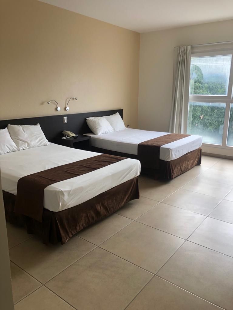 Habitación Doble con dos camas matrimoniales